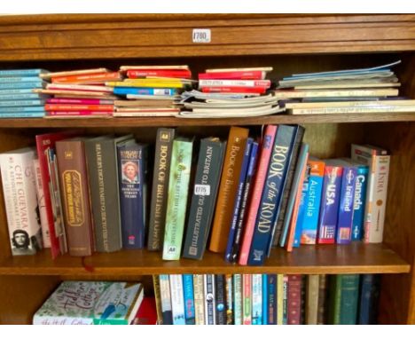 A shelf of ordnance maps and hardback books