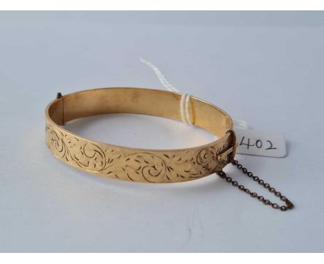 A rolled gold bangle