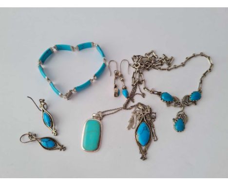 A quantity of silver turquoise jewellery including Chinese bracelet three necklaces and two pairs of earrings – 50 gms