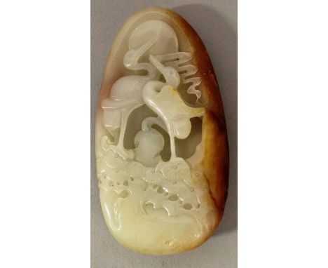A CHINSESJADE-LIKE BOULDER CARVING OF HERONS, 3.7in long.