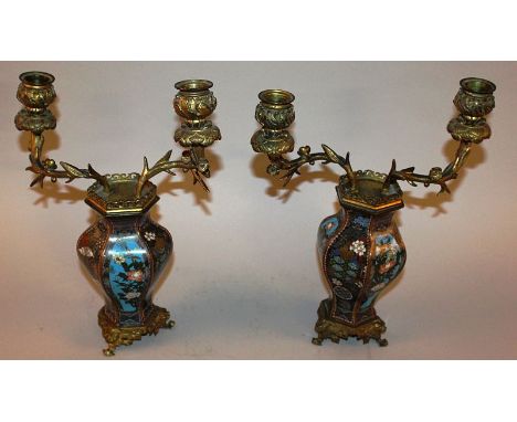 A SUPERB PAIR OF 19TH CENTURY JAPANESE CLOISONNE ENAMEL TWO LIGHT VASES of lacquered form with panels of flowers with scrolli