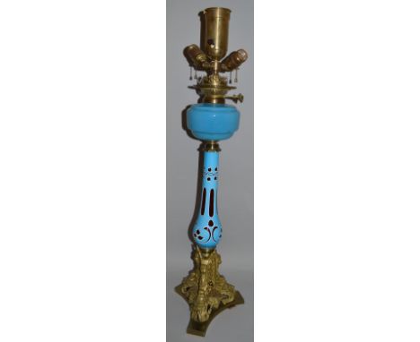 A GOOD VICTORIAN BOHEMIAN GLASS OIL LAMP with brass mounts. 34ins high.