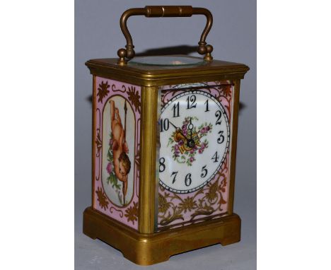 A PINK SEVRES STYLE CARRIAGE CLOCK with painted panels. 5.5ins high.