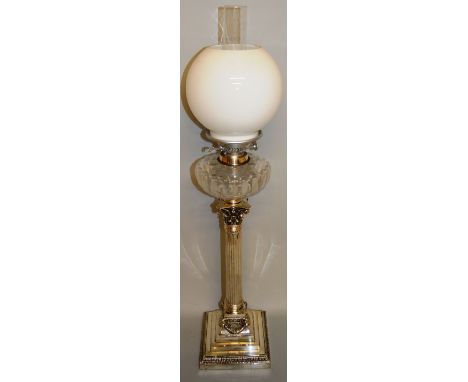 A VERY GOOD PLATE CORINTHIAN COLUMN OIL LAMP with glass reservoir and globe.