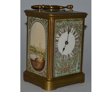 A TURQUOISE SEVRES STYLE CARRIAGE CLOCK with painted panels of Windsor Castle. 5.5ins high.
