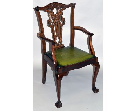 A CHIPPENDALE STYLE MAHOGANY DESK CHAIR.
