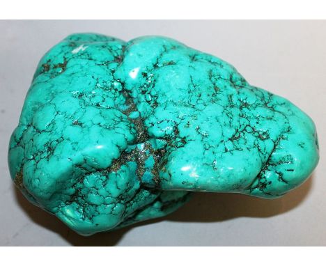 A TURQUOISE BOULDER, 6in long at its widest point.