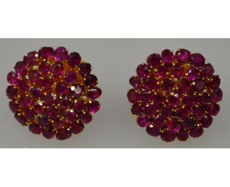 A PAIR OF RUBY CIRCULAR EARRINGS set in 20ct gold.