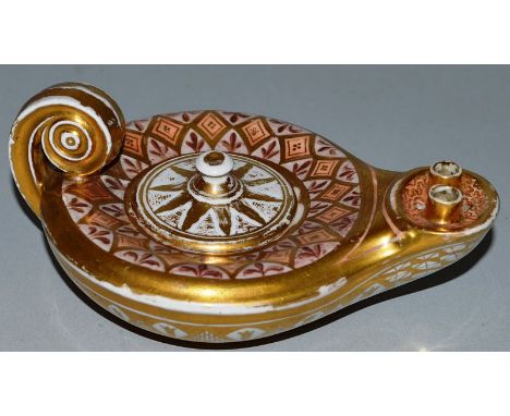 AN EARLY 19TH CENTURY COALPORT TYPE INKWELL in the shape of Aladdin’s lamp, painted with geometric shapes.