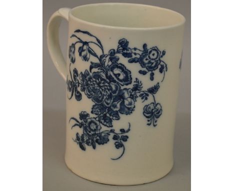 AN FINE 18TH CENTURY CAUGHLEY MUG, printed with floral bouquets in blue under-glaze.