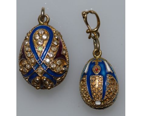 TWO, POSSIBLY RUSSIAN, BLUE ENAMEL AND DIAMOND EGGS.