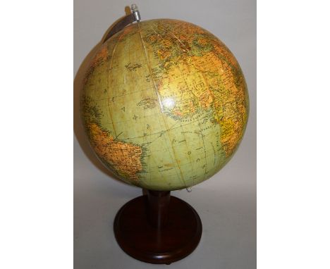 A GLOBE OF THE WORLD on a circular stand. 12ins diameter.