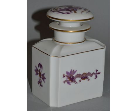 A MEISSEN PORCELAIN TEA CADDY AND STOPPER, Chinese decoration with dragons.Cross swords mark in blue. 5.5ins high.