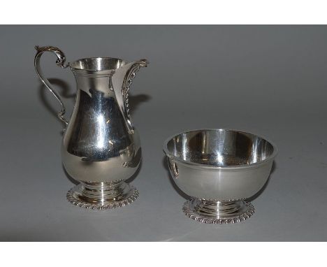 A MILK JUG AND CIRCULAR SUGAR BASIN, London 1971. 11ozs.