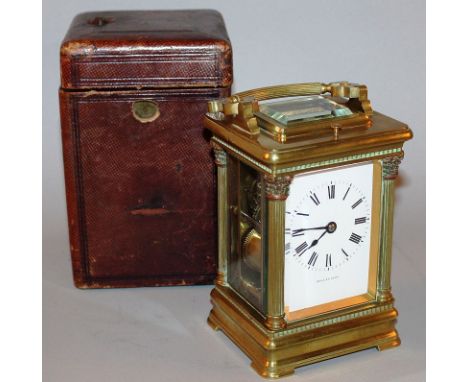 A GOOD 19TH CENTURY FRENCH BRASS CARRIAGE CLOCK with repeat action, column sides with Corinthian capitals.Bears Russian Retai