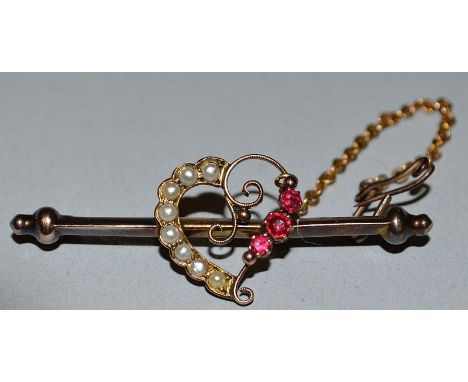 A GOLD, RUBY AND PEARL BAR BROOCH