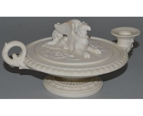 A MID 19TH CENTURY WORCESTER OR MINTON PARIAN INKWELL of oil lamp shape, the cover with a griffin finial.