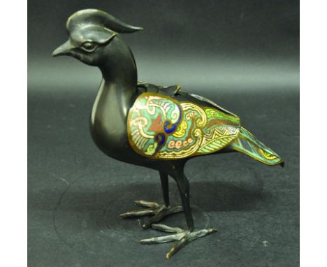 AN ORIENTAL CHAMPLEVÉ CENSER & COVER, in the form of a standing phoenix, the wings and tail with inlaid enamel decoration, 10