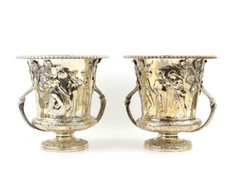 Victorian pair of silver wine coolers, by R &amp; S Garrard &amp; Co., London 1873/1874, the campana shaped bodies decorated 