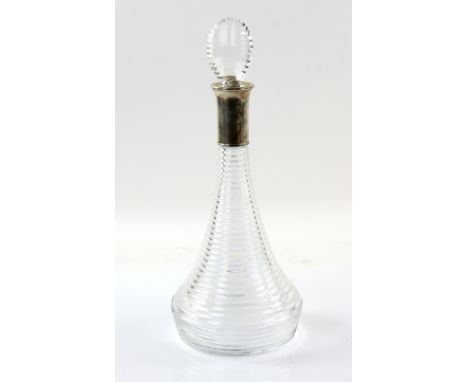 Mappin and Webb cut glass decanter with silver mount in original box.   