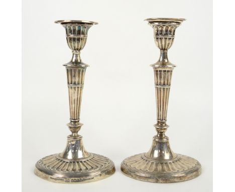 Edward VII pair of silver candlesticks with knopped and reeded stems, on oval feet, by Harrison Brothers &amp; Howson, Sheffi