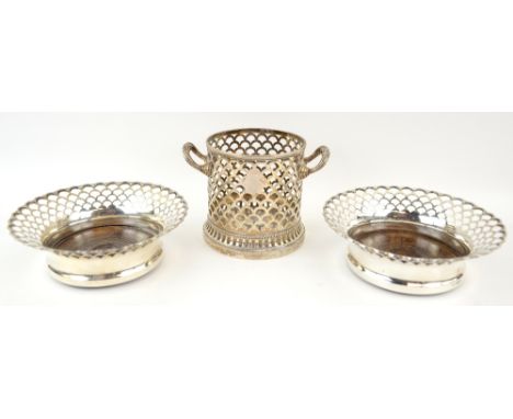 George V silver bottle stand and a pair of bottle coasters, by Mappin &amp; Webb, Sheffield 1936/7, with cut-work fish scale 