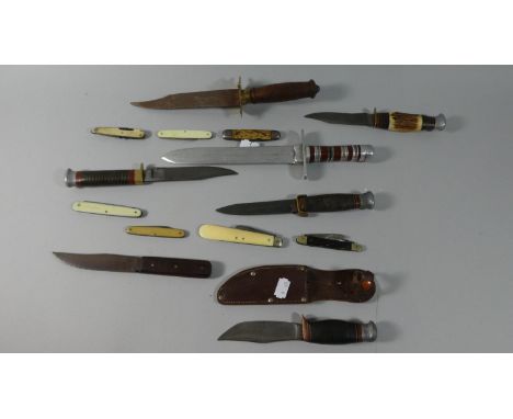 A Collection of Seven Hunting Knives and Seven Vintage Pen Knives 