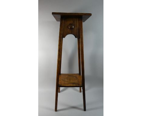 An Oak Square Topped Jardiniere Stand with Stretcher Shelf, 92cm high 