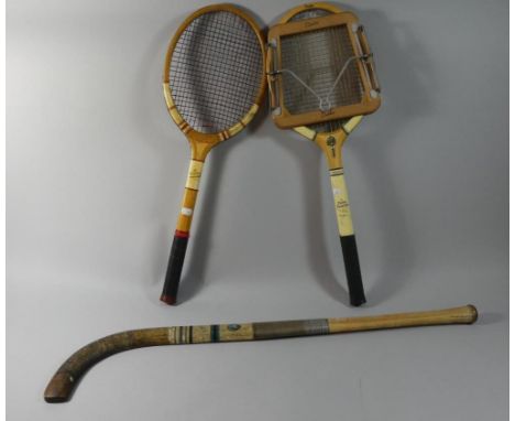Two Vintage Tennis Rackets and a Hockey Stick 