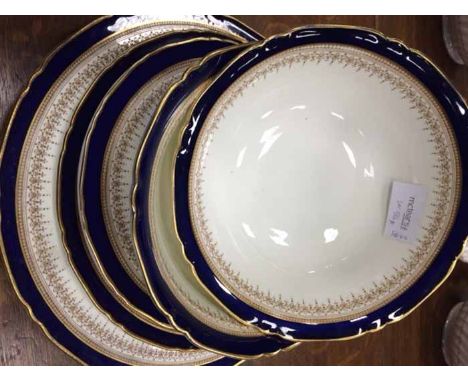 ROYAL WORCESTER PART DINNER AND TEA SERVICE
decorated with the Regency pattern, comprising twelve soup plates, eleven meat pl