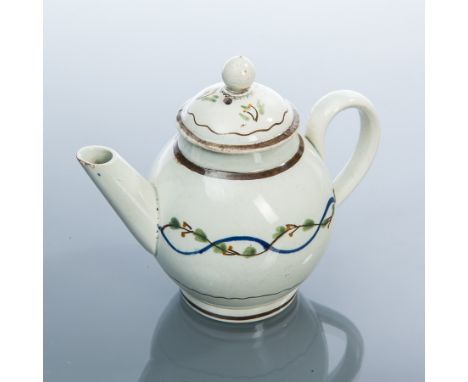 LATE 18TH CENTURY LEEDS CREAMWARE MINIATURE TEAPOT
body decorated with a twisted blue line in the style of a branch, lid with