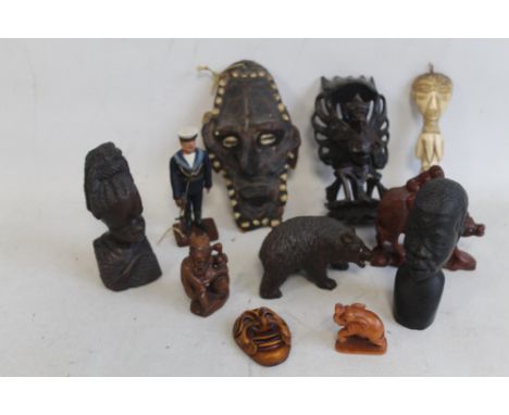 A SMALL COLLECTION OF CARVED FIGURES ETC, to include Black Forest Bear, "H.M.S Hood" sailor and a bone plaque with old label,