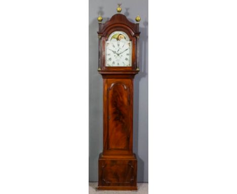 An early 19th Century mahogany longcase clock by Reid of Bigger, the 12ins arched painted metal dial with Roman and Arabic nu