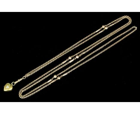 An early 20th Century 9ct rose gold flat link ball and chain pattern longard, 150mm overall, hung with small gold coloured me