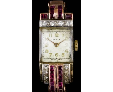 A 1960s lady's 9ct rose gold, ruby and diamond set Nidor cocktail watch, the white face with gilt Arabic numerals contained w