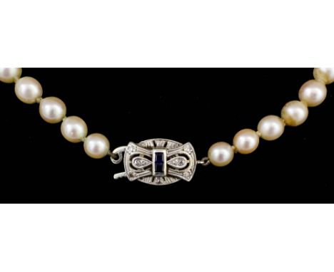 A modern single strand of graduated cultured pearls, 435mm overall, with a 9ct white gold oval pattern clasp set with two sma