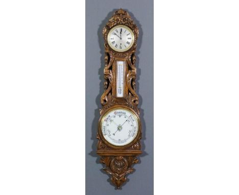 A late 19th Century oak cased aneroid barometer, thermometer and clock, the clock with 7.5ins diameter silvered dial with eng