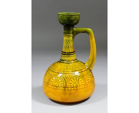 An Ault pottery "Persian" jug of "Aesthetic Movement" inspiration, originally designed by Dr. Christopher Dresser, the neck a