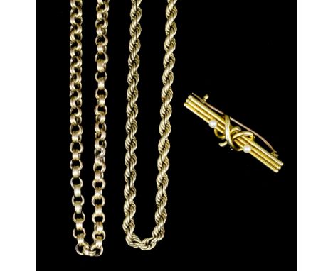 A late Victorian 15ct gold seed pearl set brooch, the bar brooch with triple rails tied with a knot surmounted by a small see