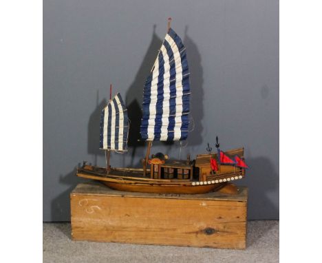 A Chinese hardwood scale model of a two masted junk, 30.5ins x 31.5ins  high, with box for same (20th Century)