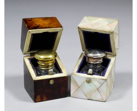 A Victorian tortoise-shell cased travelling inkwell, the interior with glass bottle and gilt silvery metal screw top, 1.675in