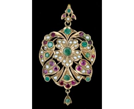 An Indian gold coloured metal mounted pearl, ruby and emerald set pendant or brooch at will, the scrolling flowerhead design 