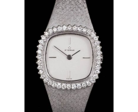 A 1980's lady's 18k white gold Eterna cocktail watch, the silvered face quarter set with baton numerals, contained in 25mm sq