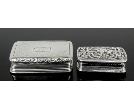 An early Victorian silver rectangular vinaigrette with cast leaf scroll pattern thumbpiece and engine turned lid and base, an