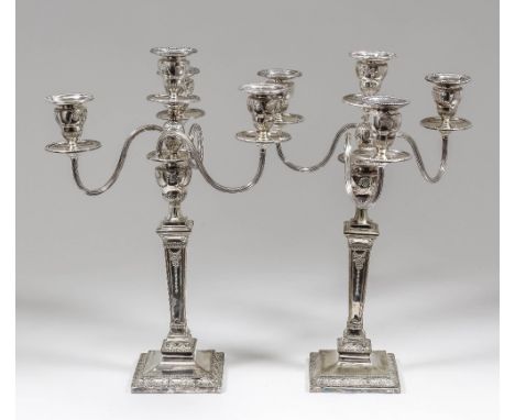 A pair of 19th Century plated four light candelabra of Neo-Classical design with bead mounts, with urn pattern sconces and sq