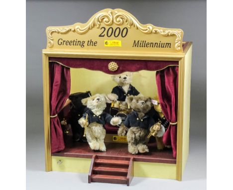 A modern Steiff Millennium band comprising five small Steiff teddy bear musicians in old gold, dark and mid brown mohair,each