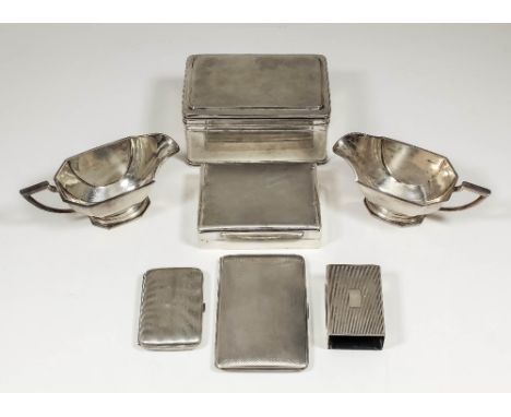 A Dutch plain silvery metal rectangular biscuit box with moulded edges to lid and footrim, 6ins wide x 4ins deep x 3ins high 