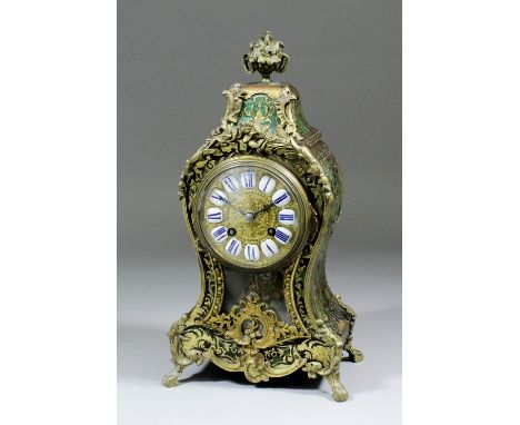 A late 19th Century French green tortoiseshell and Boulle mantel clock No. 1704 311 26 of Louis XV design, the 4ins diameter 