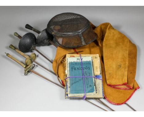A small collection of fencing equipment, comprising - a pair of foils, each 44.5ins overall, a pair of epees, each 40.5ins ov