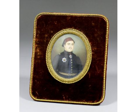 Mid 19th Century School - Miniature half length portrait of an Egyptian  officer in dress uniform, oval 3.75ins x 3ins, in di